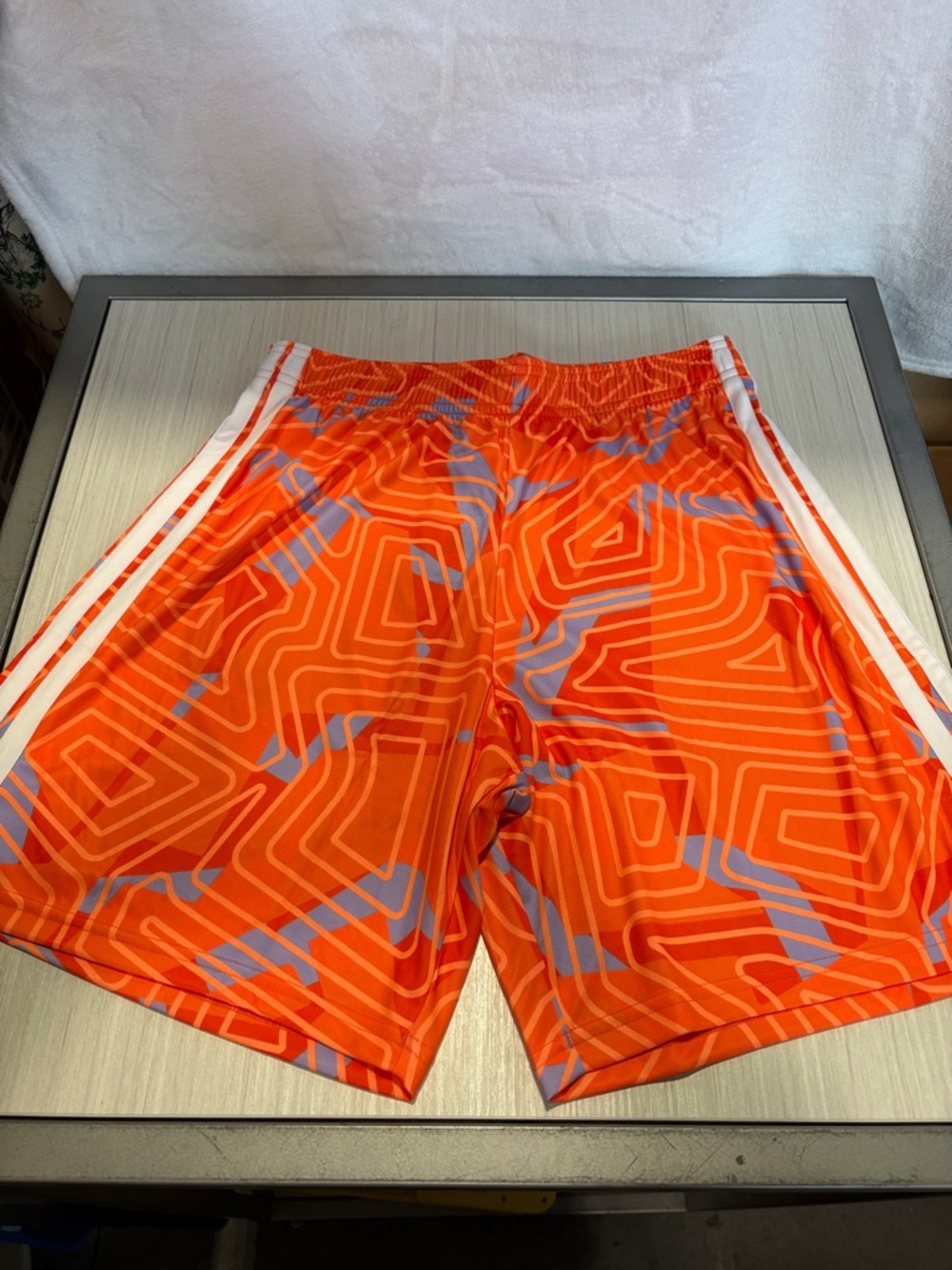 adidas Orange Geometric Athletic Shorts with White Side Stripes